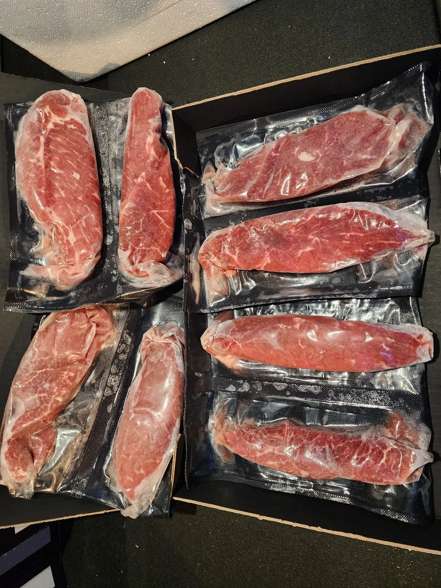Vacuum-sealed NY Strip steaks